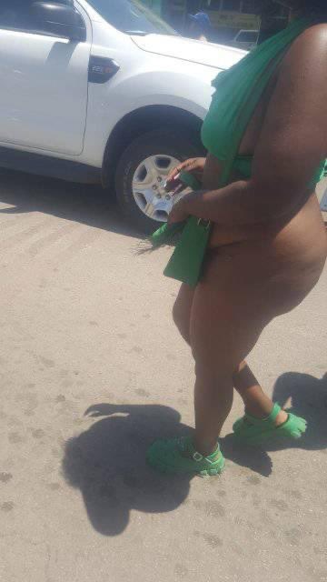 Mzansi lady in green walks the streets naked